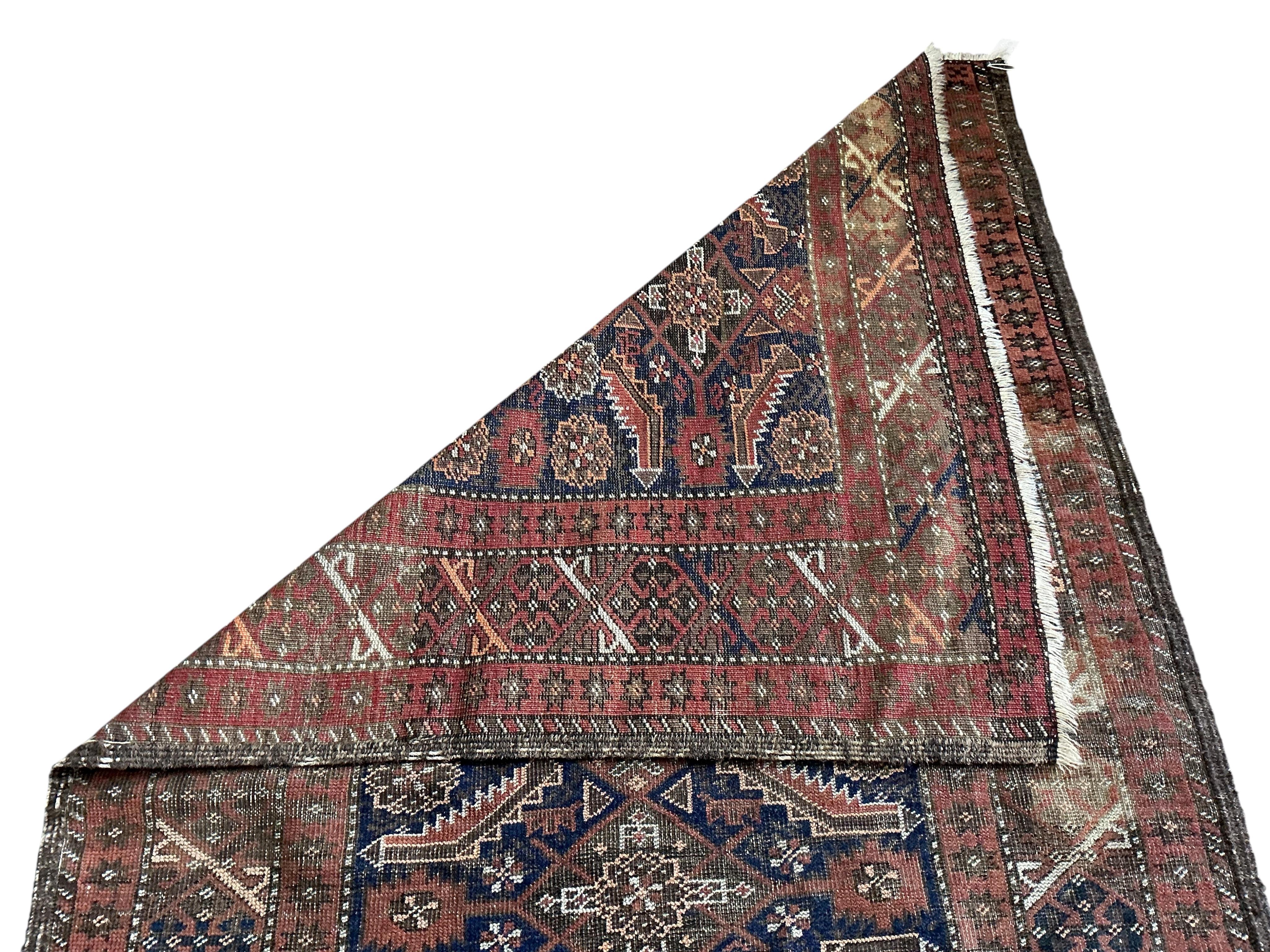 A late 19th century North West Persian blue ground rug, 206 x 123cm